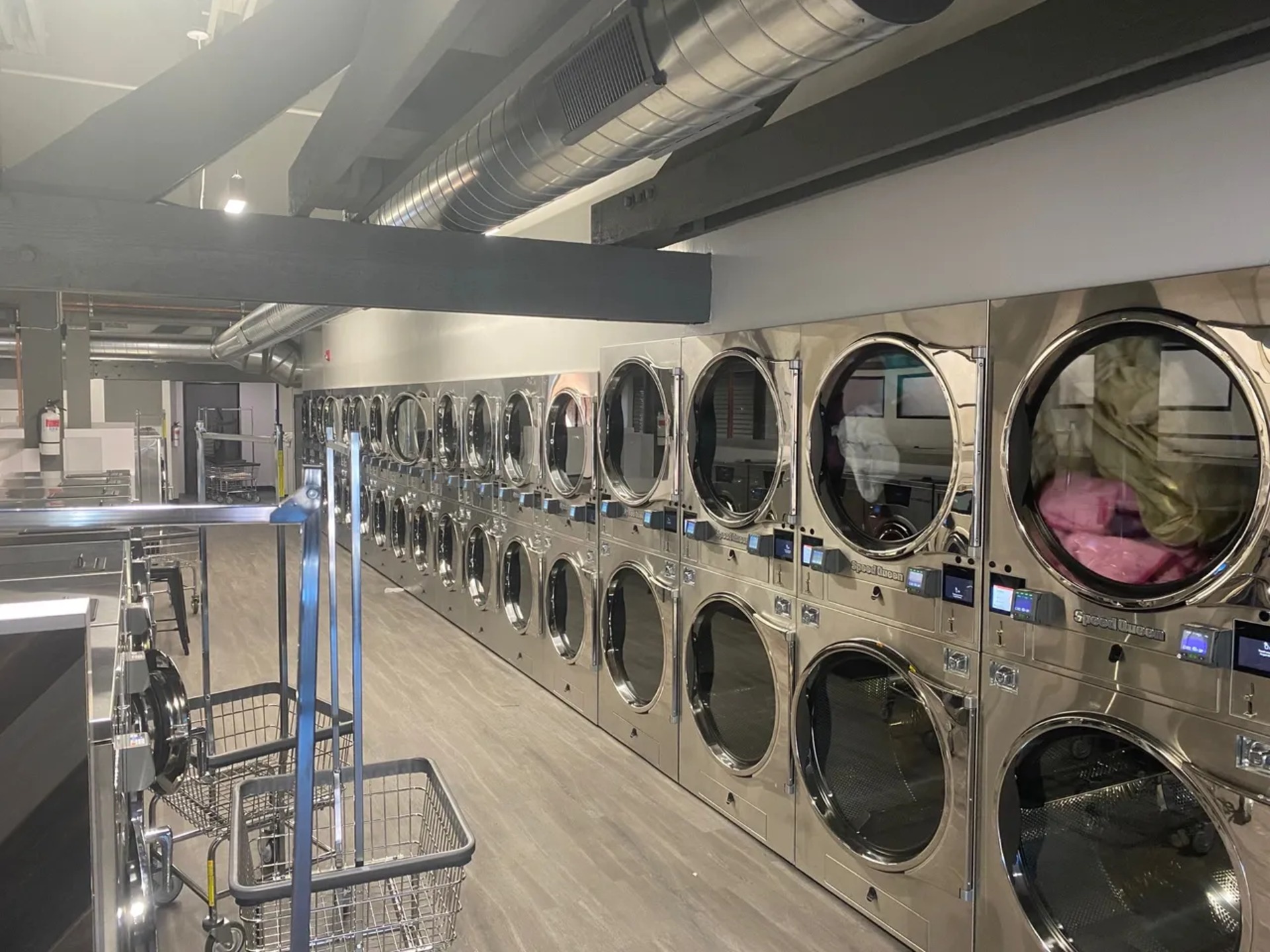Stacked commercial dryers
