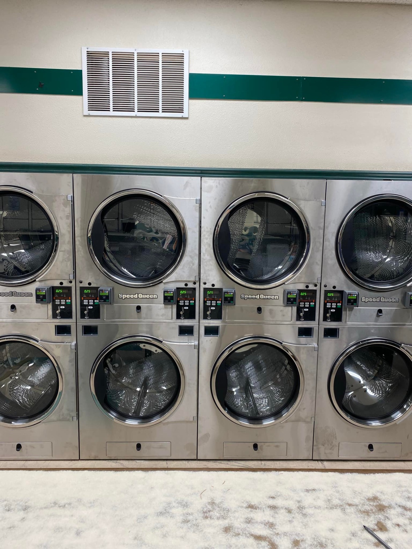 Bank of Speed Queen commercial dryers